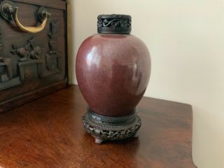18thc Chinese flambé jar with hardwood stand and carved cover. 5
