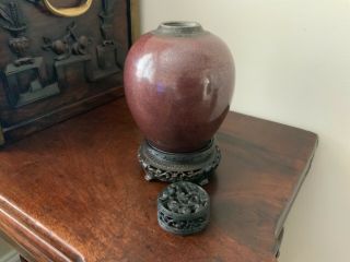18thc Chinese flambé jar with hardwood stand and carved cover. 8