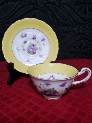 Royal Chelsea Yellow Tea Cup And Saucer And Purple Violets