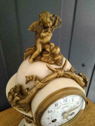 Antique French bronze and white marble 8 column clock with cupid 5
