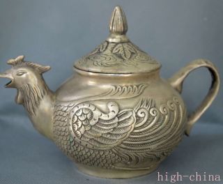China Handwork Collectable Miao Silver Carve Exorcism Phoenix Auspicious Teapots