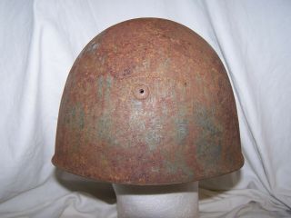 Italian M33 helmet,  in the Spanish Civil War 1936 - 39.  paint.  Sz 59 3