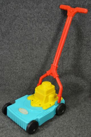 Vintage Marx Plastic Lawn Mower Push Toy