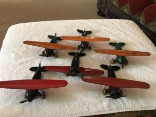 Group Of 6 Vintage Wyandotte Pressed Steel Toy Airplanes Wood Wheels Metal Prop