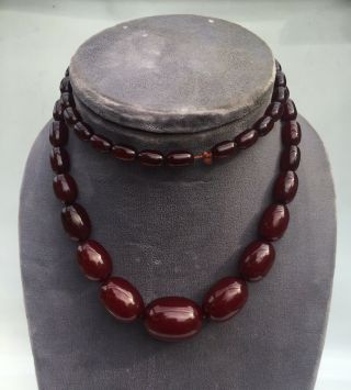 Vintage Cherry Amber Red Bakelite 54 Oblong Bead 31” Long 59 Gram Necklace