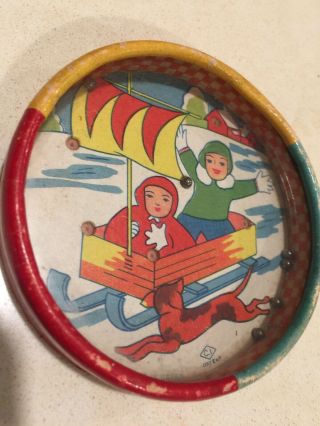 Early 1900’s Dexterity Puzzle Children Sledding With Dog