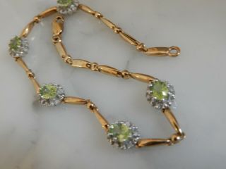 A Stunning 9 Ct Gold Oval Peridot And Diamond Cluster Bracelet