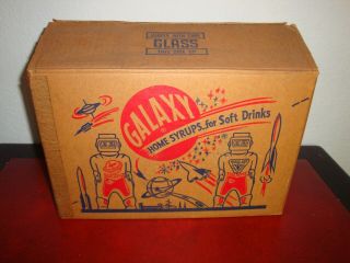 12 Vintage Galaxy Syrup Space Man Bottle Banks Full Case W/Original Box NOS 12