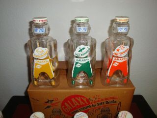 12 Vintage Galaxy Syrup Space Man Bottle Banks Full Case W/Original Box NOS 2