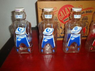 12 Vintage Galaxy Syrup Space Man Bottle Banks Full Case W/Original Box NOS 3