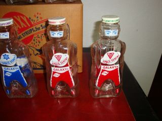 12 Vintage Galaxy Syrup Space Man Bottle Banks Full Case W/Original Box NOS 4