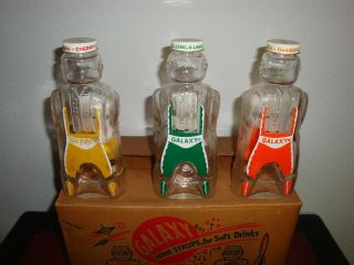 12 Vintage Galaxy Syrup Space Man Bottle Banks Full Case W/Original Box NOS 6