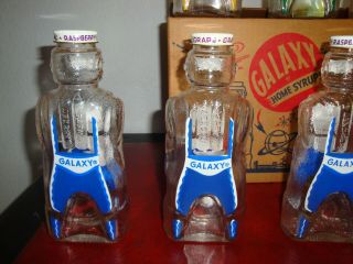 12 Vintage Galaxy Syrup Space Man Bottle Banks Full Case W/Original Box NOS 7