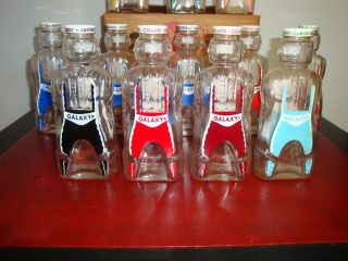 12 Vintage Galaxy Syrup Space Man Bottle Banks Full Case W/Original Box NOS 9