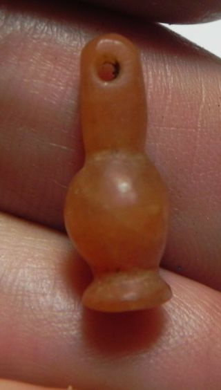Zurqieh - As11862 - Ancient Egypt,  18th Dynasty Carnelian Poppy Seed Bead.  1400 B.  C