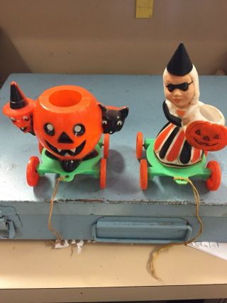 Two Antique Vintage Halloween Plastic Pull Toys