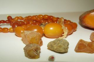 An Antique Victorian Baltic Amber Bead Necklace And Loose Amber Gems,  54 Grams
