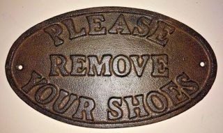 " Please Remove Your Shoes " Sign Oval Plaque Cast Iron Metal Brown Patina Finish