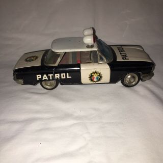 Ichiko Japan Tin Friction Chevy Corvair Police Patrol Car 1960 