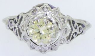 Antique 14K WG.  82CT VS diamond wedding/engagement ring w/.  70CT ctr.  size 7.  5 2