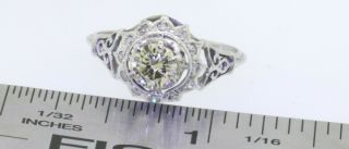 Antique 14K WG.  82CT VS diamond wedding/engagement ring w/.  70CT ctr.  size 7.  5 3
