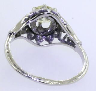 Antique 14K WG.  82CT VS diamond wedding/engagement ring w/.  70CT ctr.  size 7.  5 4