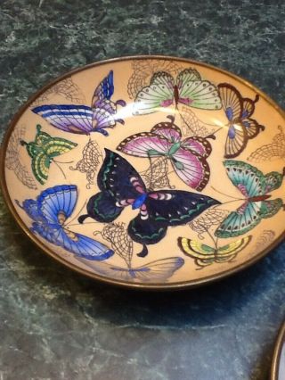 Two Butterfly Plates With Brass Covers.