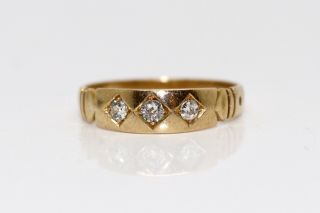 A Stunning Antique Victorian 18ct Gold 0.  15ct Diamond Three Stone Band Ring