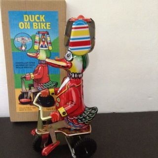 Duck On A Bike Tin Litho Windup Toy Box Propeller Spins Duck Rolls