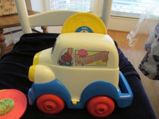 VINTAGE TOMY MUSICAL TRUCK WITH 4 DISCS VERY RARE HARD TO FIND BATTERIES INSIDE 5