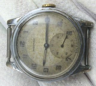 VINTAGE MILITARY MOVADO.  31mm.  cal.  75 2