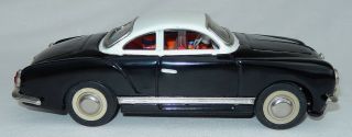 Vtg.  (Toy Brand) Friction Tin Car Black/White Sedan - Karmann Gia Made China 3