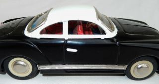 Vtg.  (Toy Brand) Friction Tin Car Black/White Sedan - Karmann Gia Made China 8
