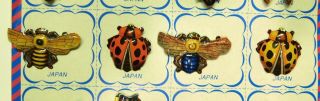 12 Vintage Japanese Tin Insect Novelty Badges on Card - A 4