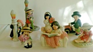 Licenced By Enesco,  Nbm,  Alaska Momma Porcelain Figurines - 7 Piece Set