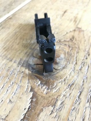 M1 Carbine Trigger Housing made by IBM Corp - marked BE - B 8