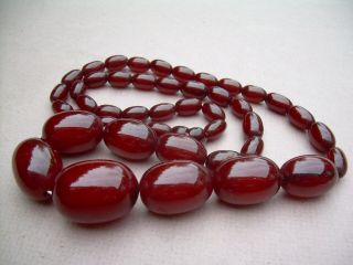 Antique Art Deco Cherry Amber Bakelite Bead Necklace 60.  67 grams. 3
