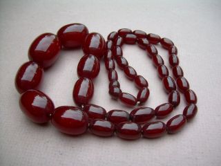 Antique Art Deco Cherry Amber Bakelite Bead Necklace 60.  67 grams. 4