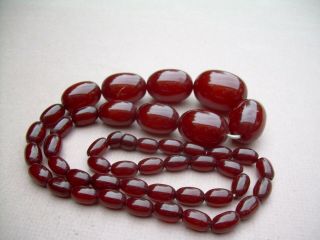 Antique Art Deco Cherry Amber Bakelite Bead Necklace 60.  67 grams. 5