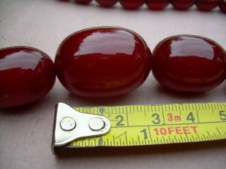 Antique Art Deco Cherry Amber Bakelite Bead Necklace 60.  67 grams. 6