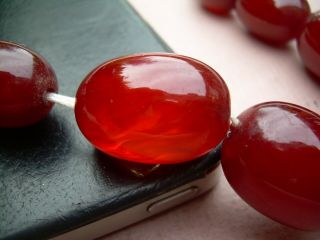 Antique Art Deco Cherry Amber Bakelite Bead Necklace 60.  67 grams. 9