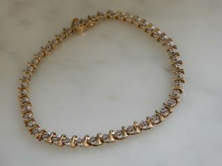 A 9 Ct Gold Diamond Set Bracelet