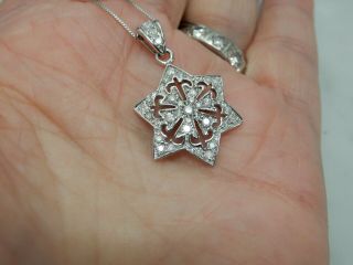A Stunning 9 Ct White Gold Diamond Star Pendant And Chain