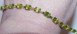 10k Peridot Tennis Bracelet Oval Link 6.  00ct 7 1/2 " Yellow Gold