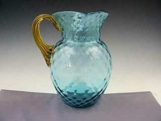 Victorian Blue Glass Water Pitcher With Applied Reeded Amber Glass Handle