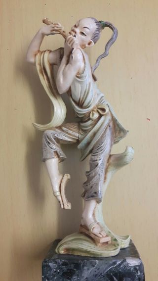 Oriental Chinese Figure Playing Flute