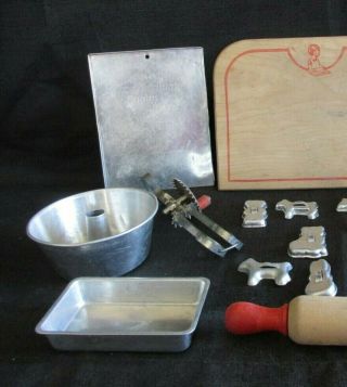 Vintage 1950 ' s Toy Aluminum Child ' s Bake Set - Pans Cookie Cutters Beater & More 2