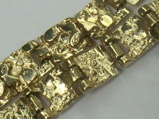 DESIGNER heavy 14K solid yellow gold NUGGET LINK bracelet.  7 