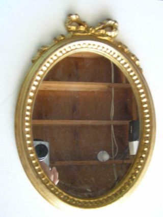 Antique Wood Carved Gothic Gold Gilt Mirror Small Oval Italian Mirror Bow On Top