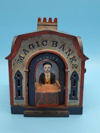 Antique Magic Bank Cast Iron Mechanical Coin Bank Pat.  J & E Stevens 1873 & 1876